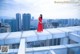 Beauty Crystal Lee ventured into blooming on the roof of a high-rise building (8 photos)